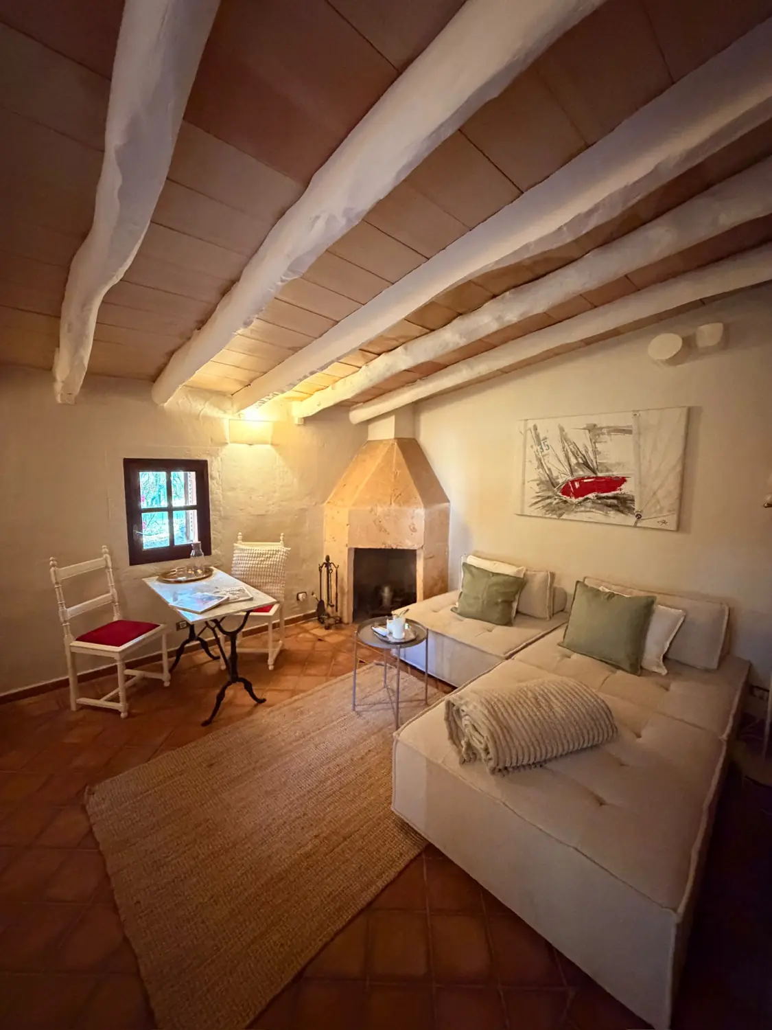 Living room with fireplace and sofas